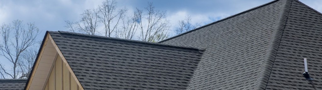 Grey asphalt shingles on a residential roof.